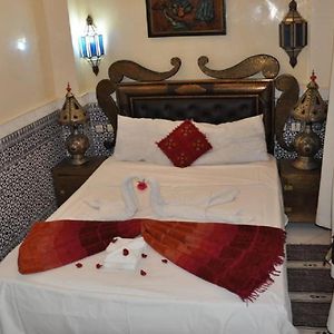 Kamer met een Queen Size Bed